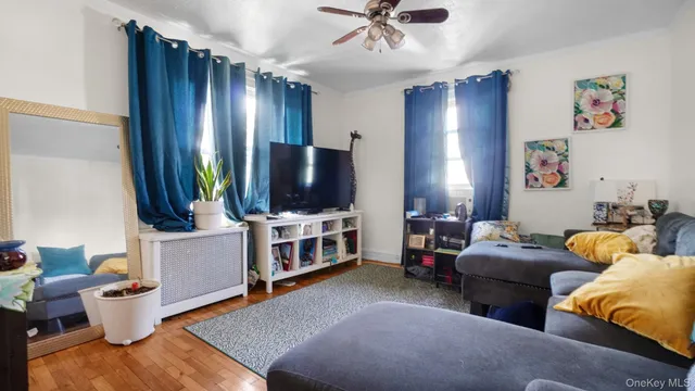 a kitchen with stainless steel appliances a sink window and cabinets