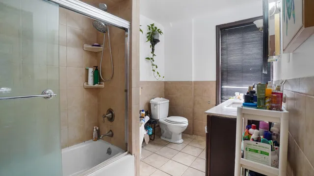 a view of hallway with stairs and a living room