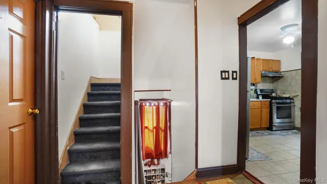 a bedroom with furniture and wooden floor