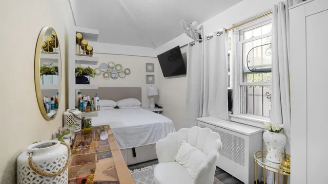 a kitchen with stainless steel appliances a stove a microwave and cabinets