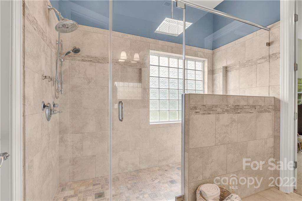 932 Treasure Court Fort Mill, SC 29708 - Photo 15 of 34 a bathroom with a shower and a sink