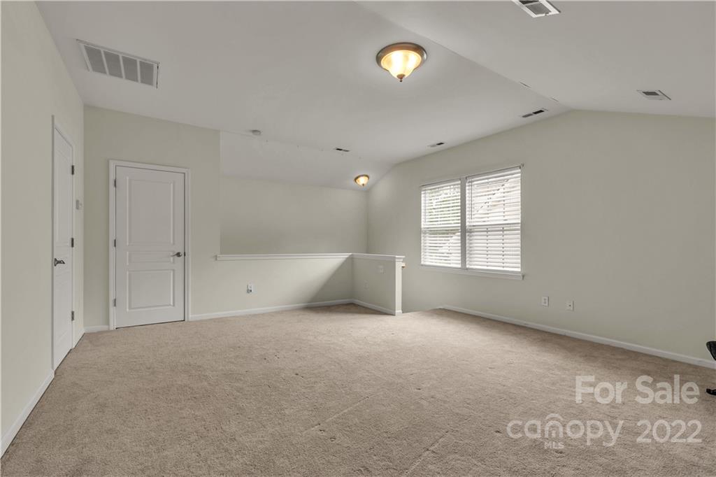 932 Treasure Court Fort Mill, SC 29708 - Photo 22 of 34 an empty room with windows