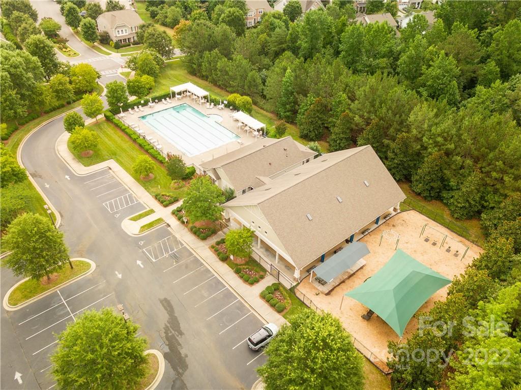 932 Treasure Court Fort Mill, SC 29708 - Photo 31 of 34 an aerial view of a house with a yard and swimming pool
