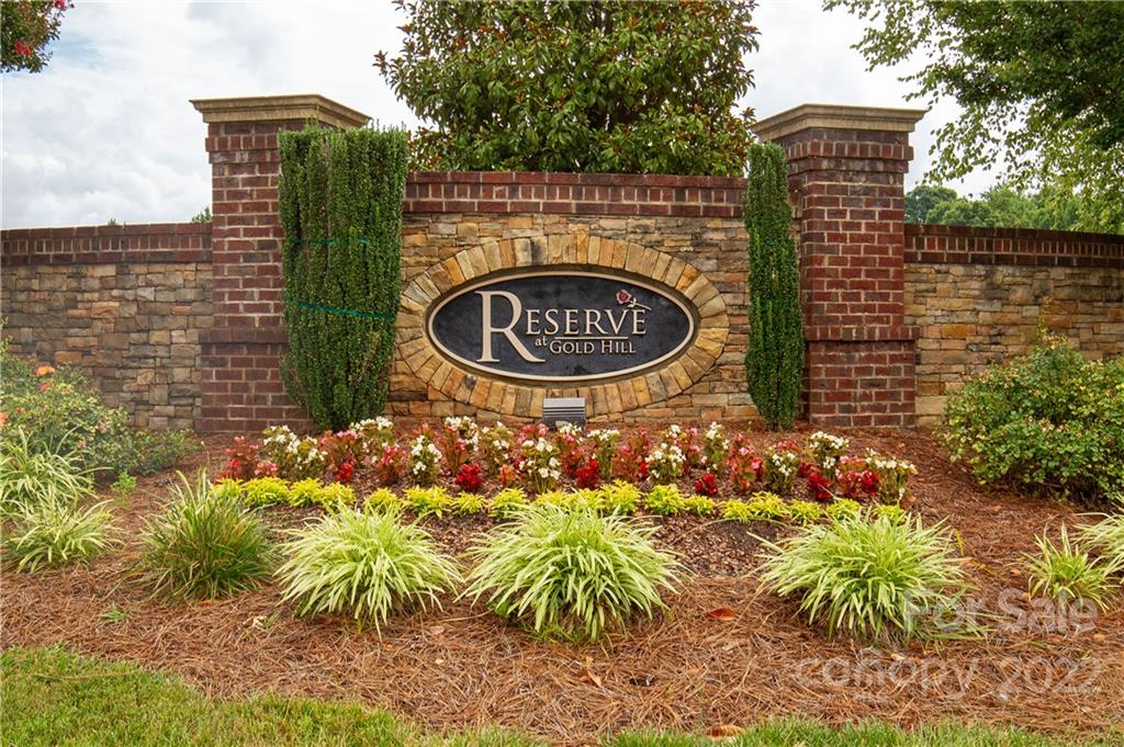 932 Treasure Court Fort Mill, SC 29708 - Photo 34 of 34 a sign that is sitting in front of flowers
