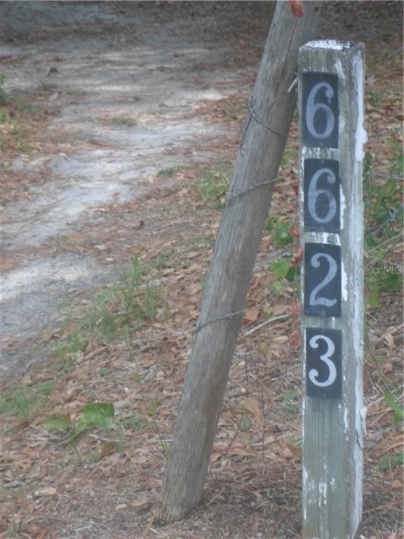 6623 Simmons Loop Riverview, FL 33578 - Photo 1 of 1 ADDRESS MARKER IN FRONT.