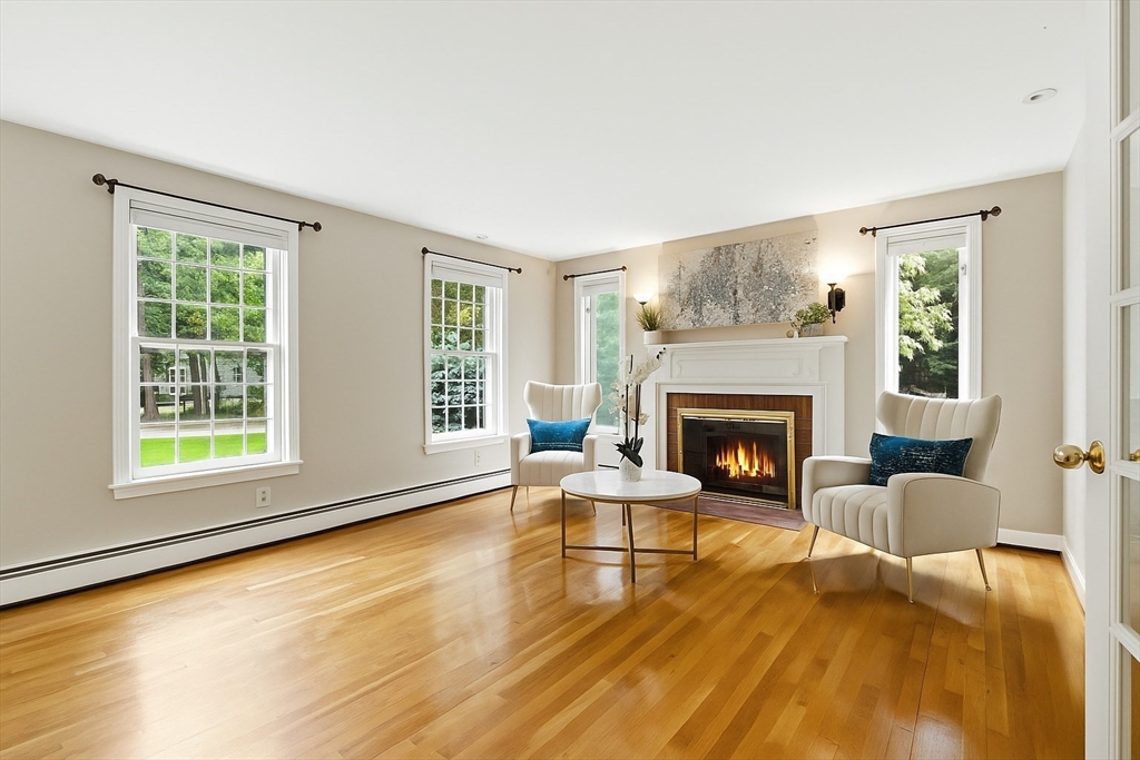 28 Janes Road Boxford, MA 01921 - Photo 19 of 41 a living room with furniture and a fireplace