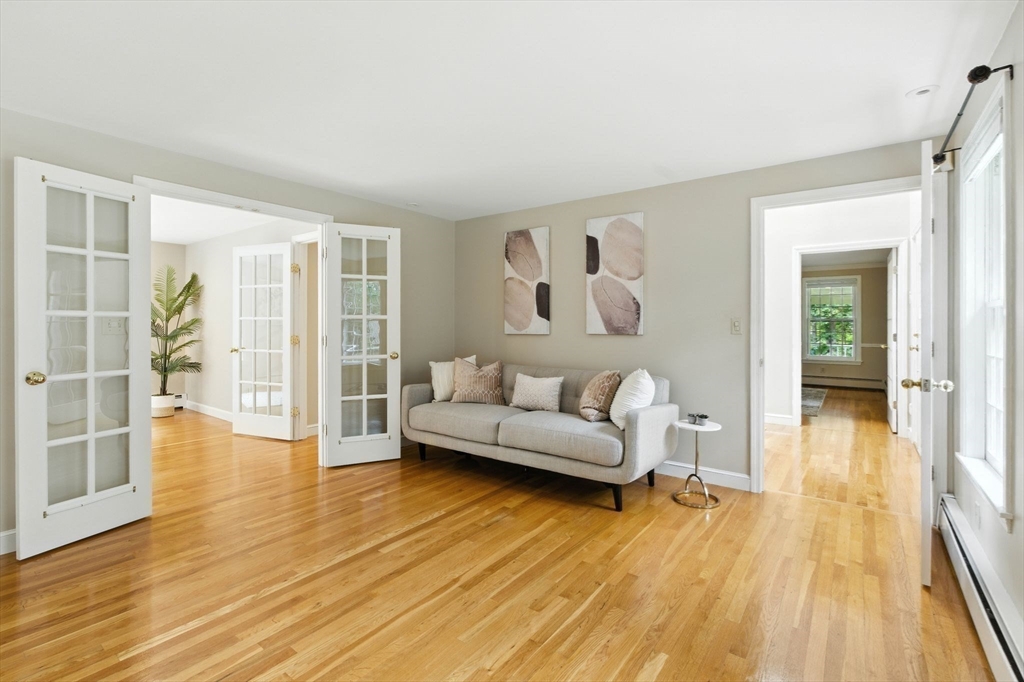 28 Janes Road Boxford, MA 01921 - Photo 20 of 41 a living room with furniture and a wooden floor