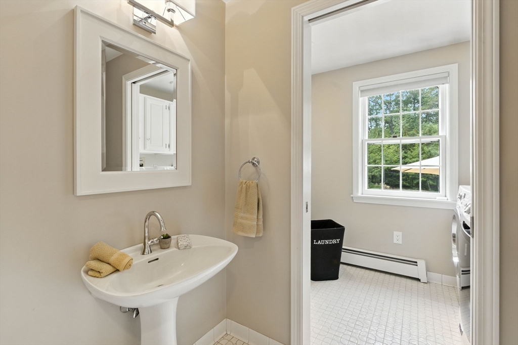 28 Janes Road Boxford, MA 01921 - Photo 23 of 41 a bathroom with a sink and a mirror