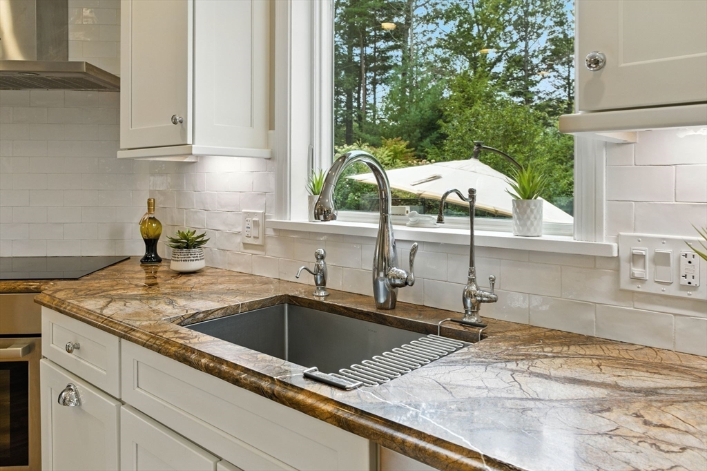28 Janes Road Boxford, MA 01921 - Photo 27 of 41 a kitchen with a sink and large window