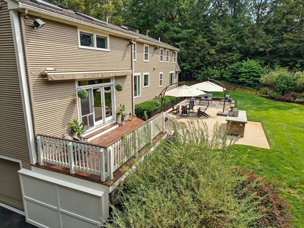 28 Janes Road Boxford, MA 01921 - Photo 31 of 41 a view of a house with backyard and sitting area