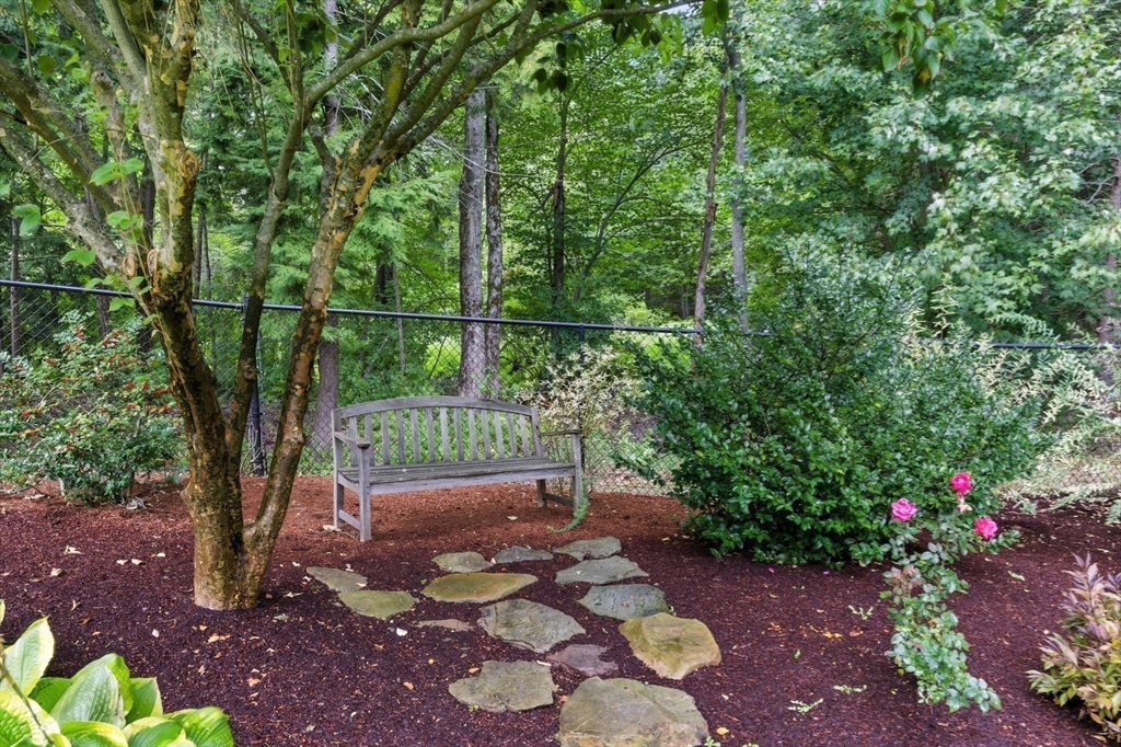 28 Janes Road Boxford, MA 01921 - Photo 37 of 41 a view of a bench in the garden