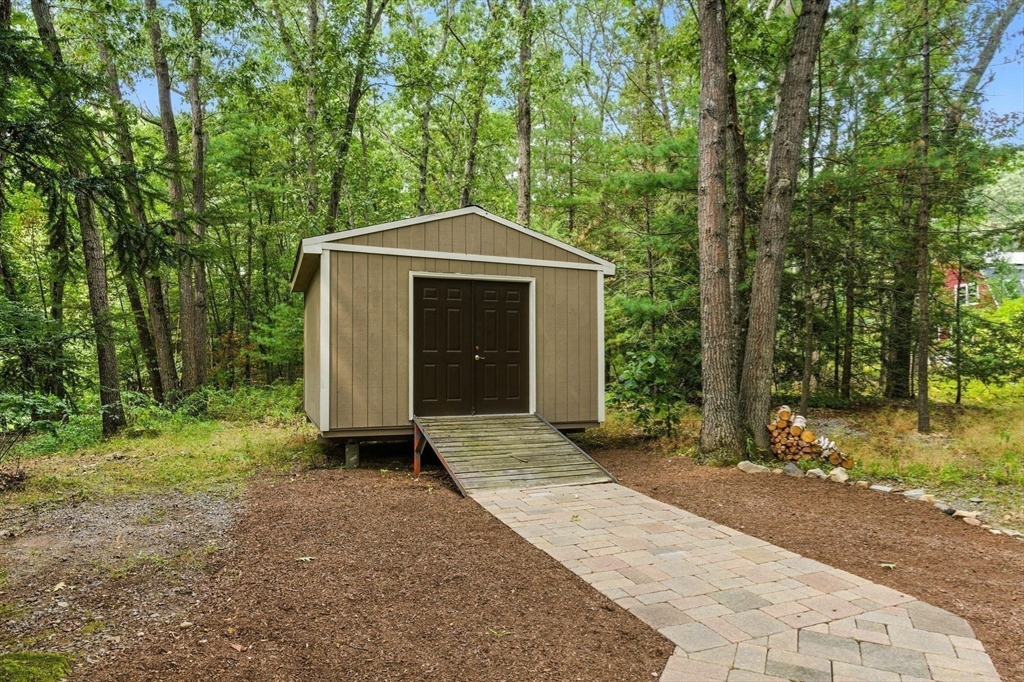 28 Janes Road Boxford, MA 01921 - Photo 38 of 41 a front view of a house with a yard