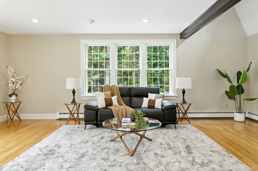 28 Janes Road Boxford, MA 01921 - Photo 7 of 41 a living room with furniture and a large window