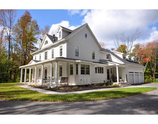 458 Boston Road Sutton, MA 01590 - Photo 1 of 1 a front view of a house with a yard