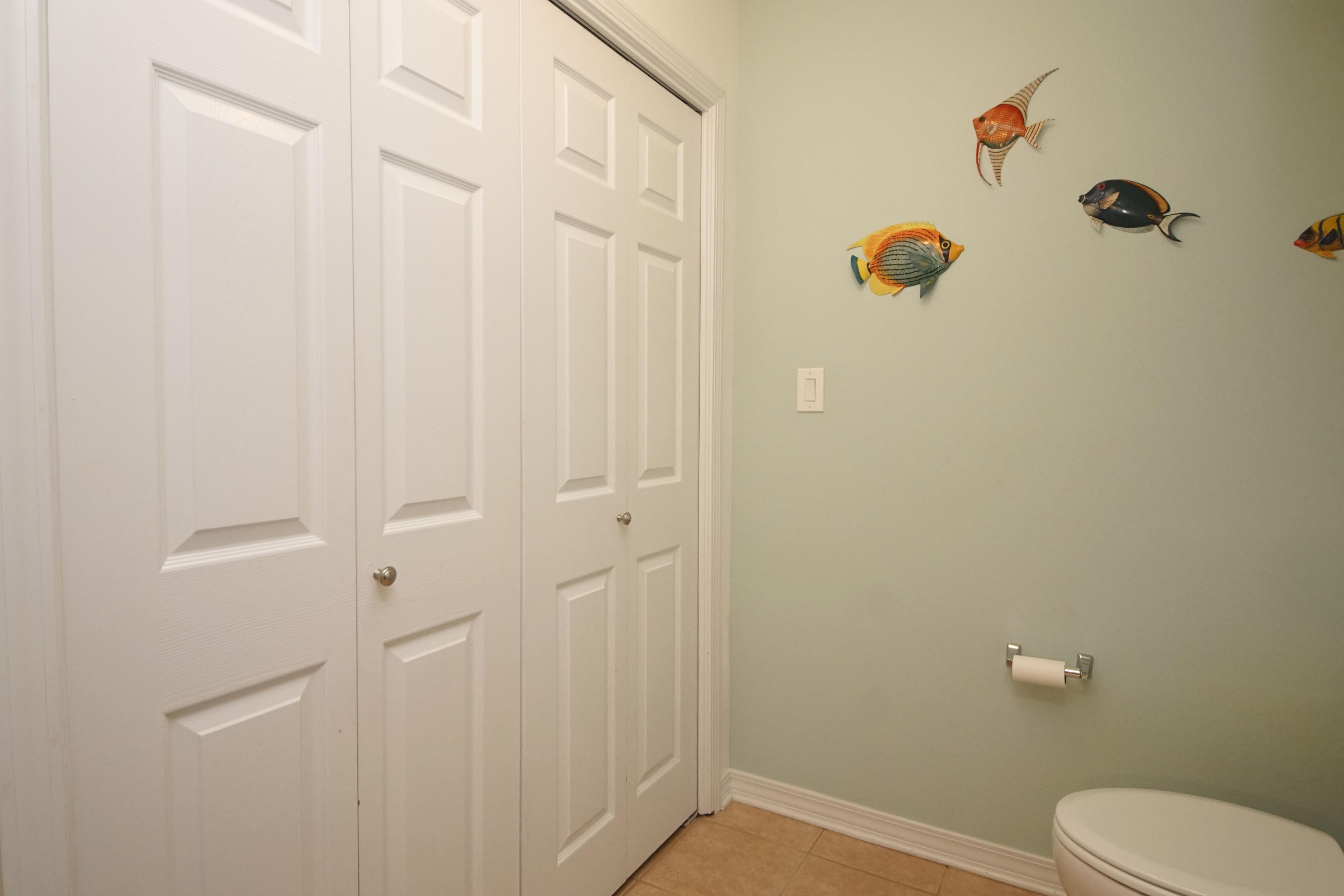 1956 Woodcrest Ridge Fort Walton Beach, FL 32547 - Photo 11 of 23 a bathroom with a shower curtain
