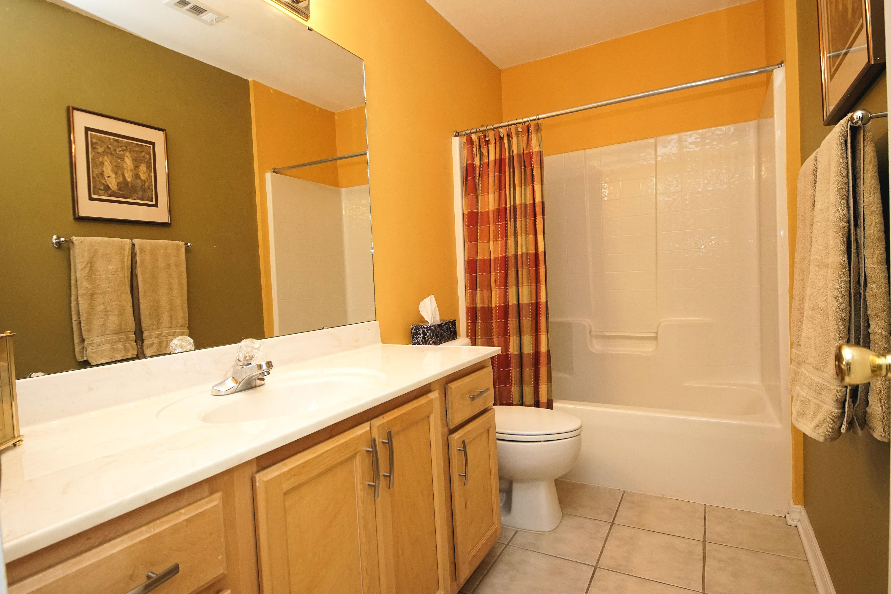1956 Woodcrest Ridge Fort Walton Beach, FL 32547 - Photo 17 of 23 a bathroom with a sink a toilet and shower