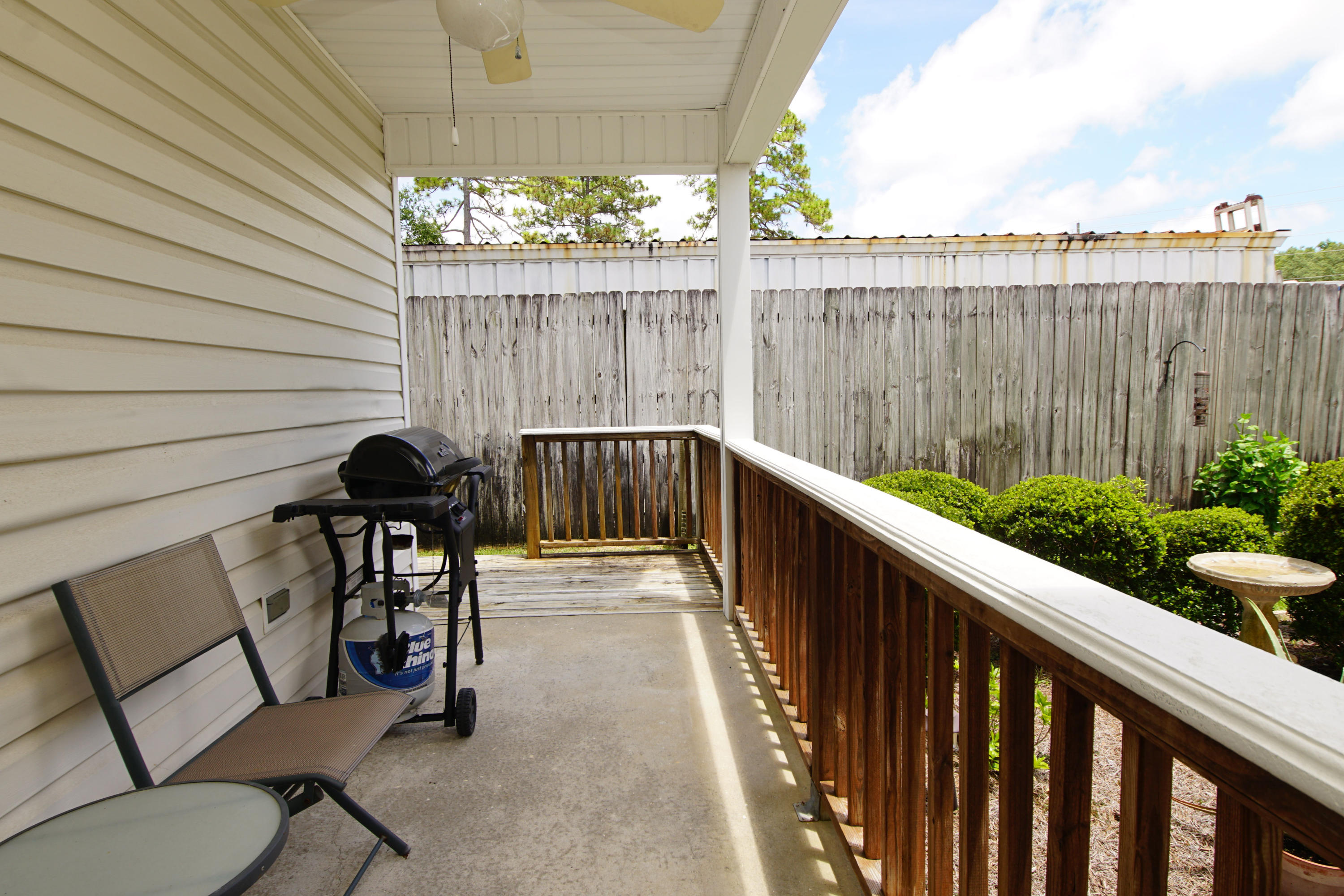 1956 Woodcrest Ridge Fort Walton Beach, FL 32547 - Photo 19 of 23 a view of balcony with wooden floor and outdoor seating