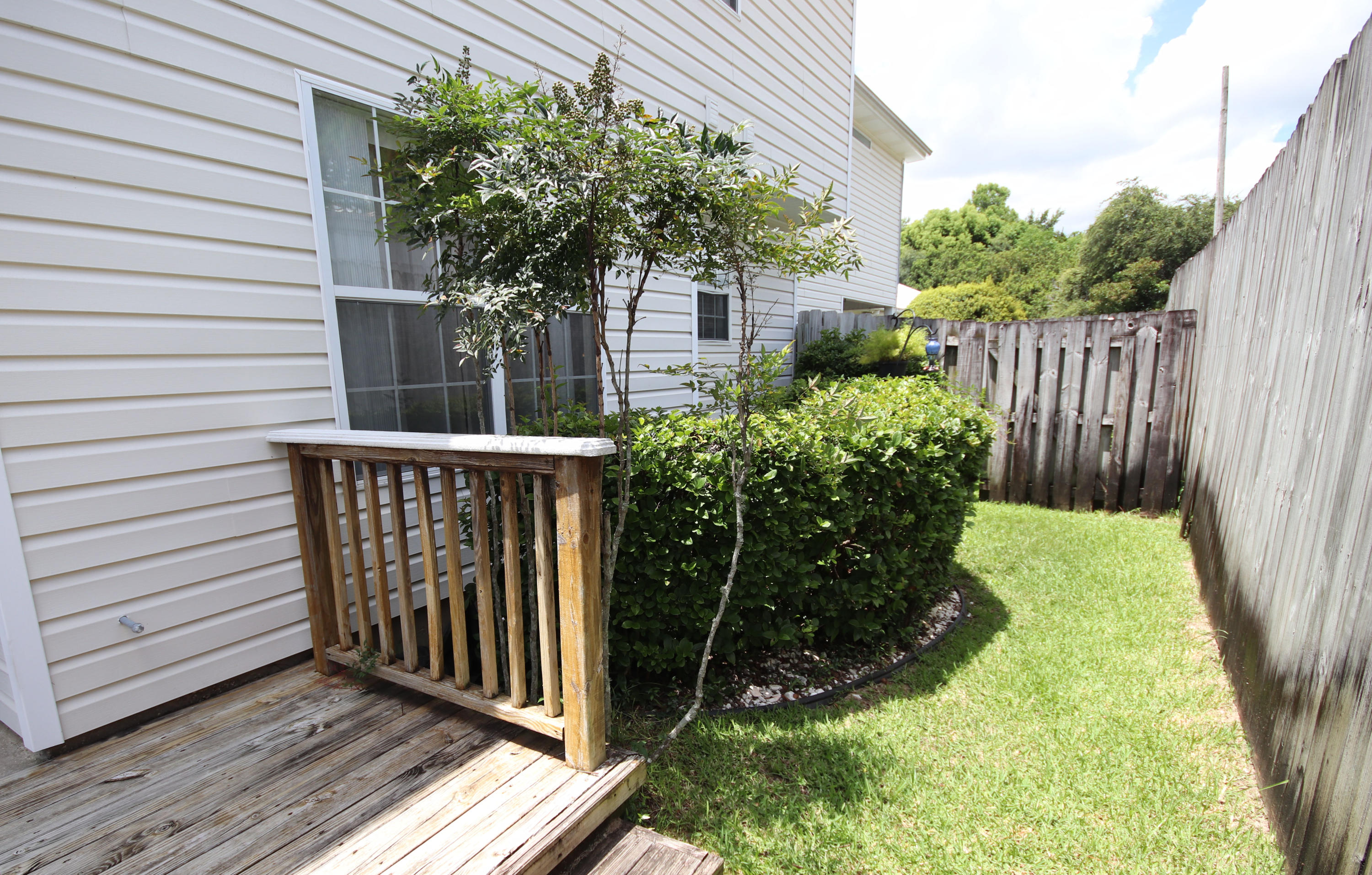 1956 Woodcrest Ridge Fort Walton Beach, FL 32547 - Photo 20 of 23 a view of a backyard with pathway