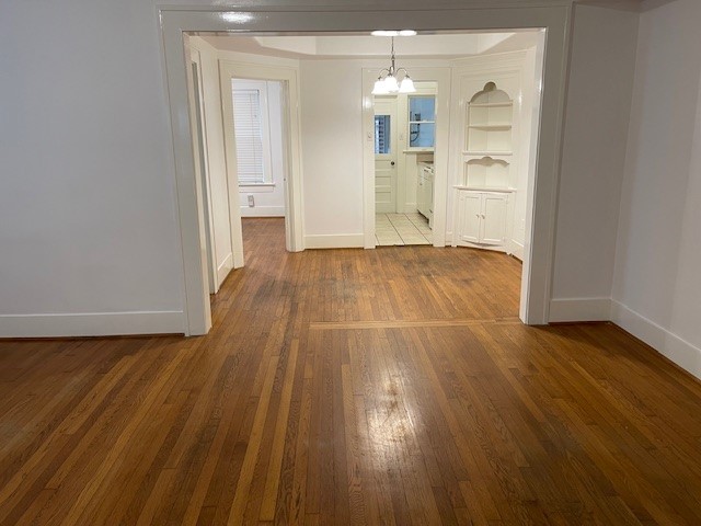 1661 Kipling Street, Unit 2 Houston, TX 77006 - Photo 4 of 10 a view of empty room with wooden floor