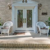a view of outdoor space yard and front view of house