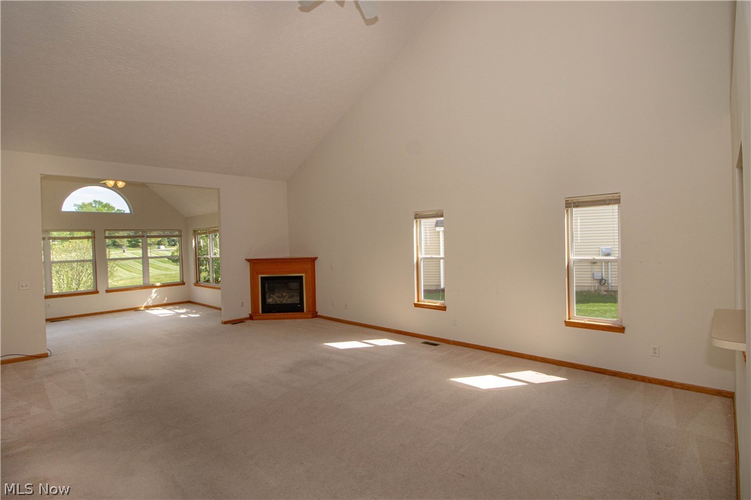 4902 Foote Road, Unit 36 Medina, OH 44256 - Photo 5 of 21 Vaulted ceilings, gas fireplace, and sunroom provide lots of flexibility in function.