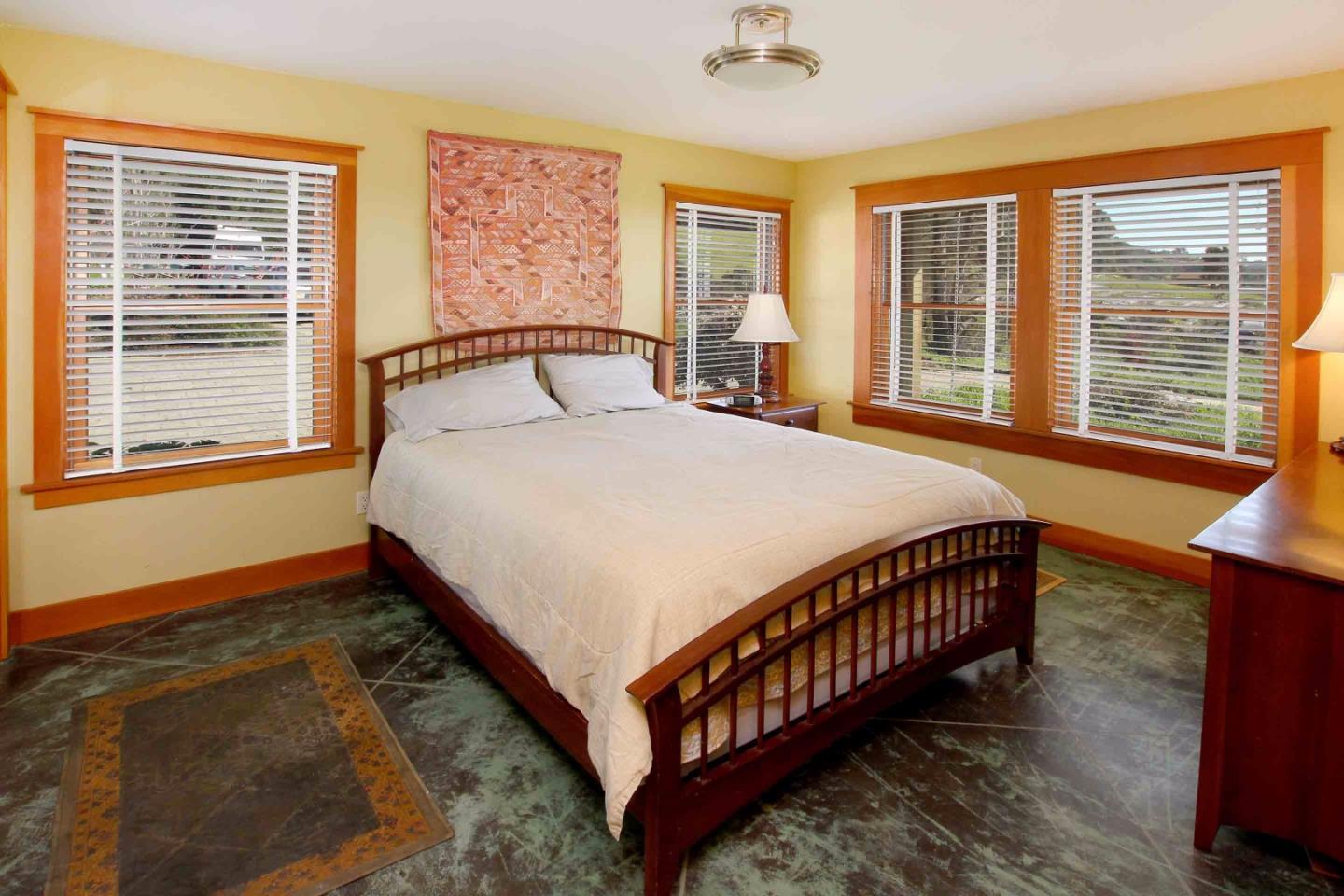 266 Webb Road Watsonville, CA 95076 - Photo 18 of 40 a bed sitting in a bedroom next to a window