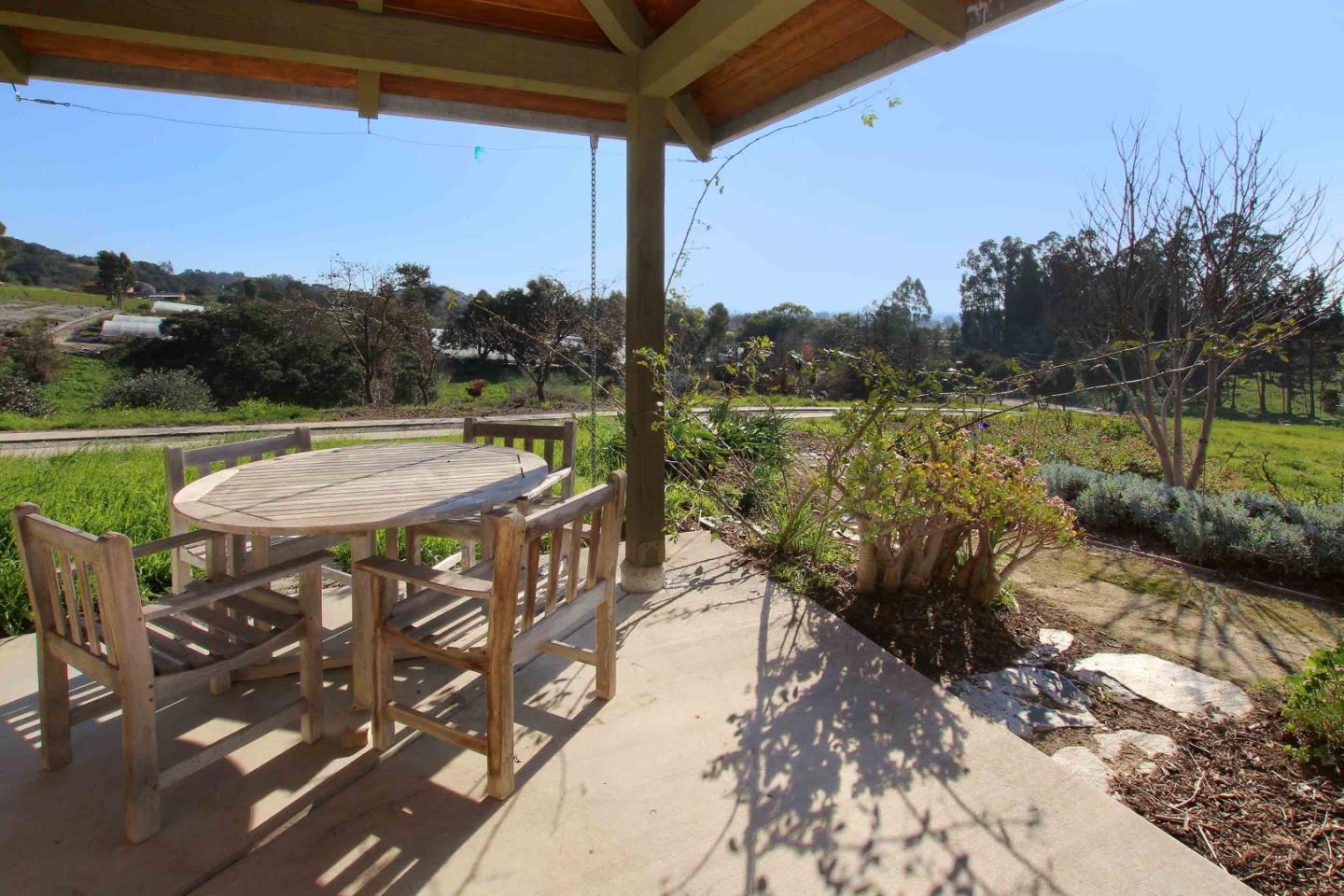 266 Webb Road Watsonville, CA 95076 - Photo 22 of 40 a view of a patio with chair and table