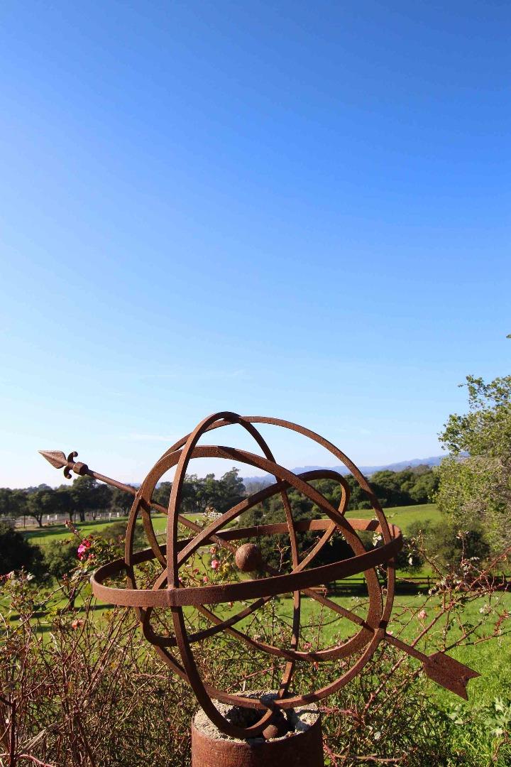 266 Webb Road Watsonville, CA 95076 - Photo 39 of 40 a backyard of a house with table and chairs