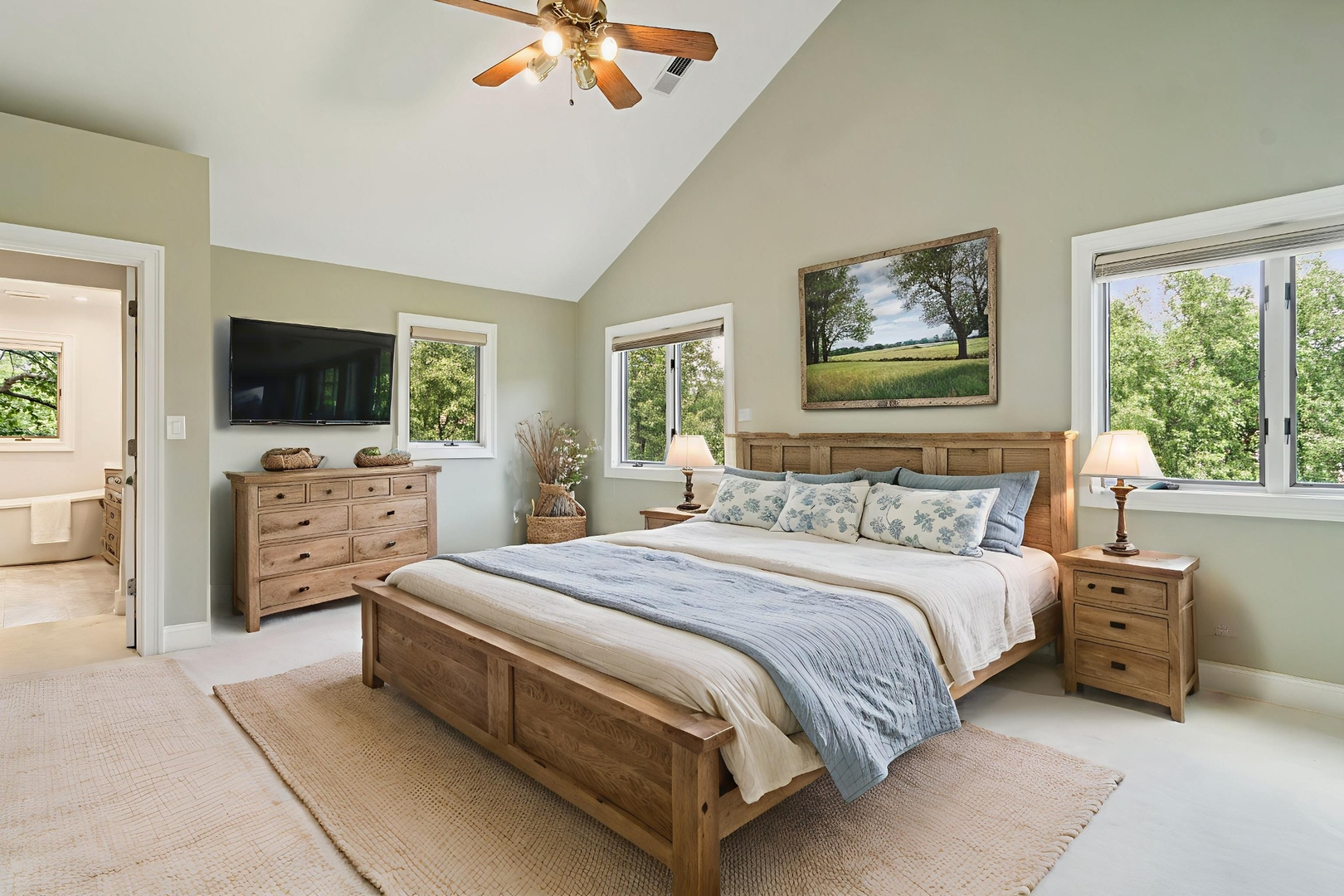 2223 Shetland Road Inverness, IL 60010 - Photo 17 of 40 a spacious bedroom with a bed and a flat screen tv