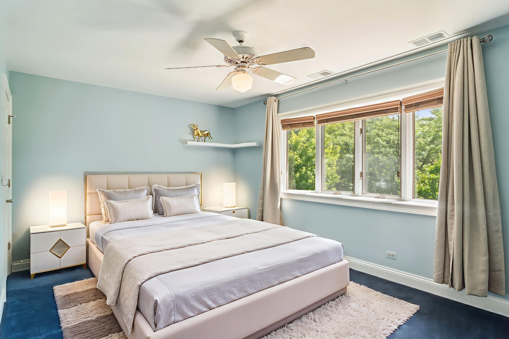 2223 Shetland Road Inverness, IL 60010 - Photo 23 of 40 a bedroom with a large bed and a large window