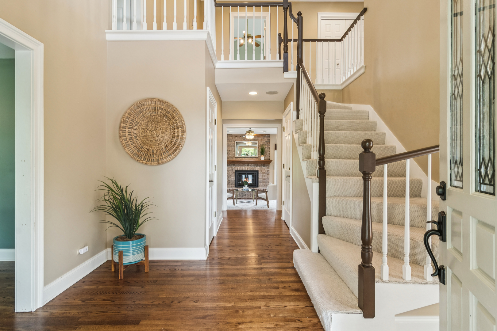 2223 Shetland Road Inverness, IL 60010 - Photo 3 of 40 a view of entryway and hall with wooden floor