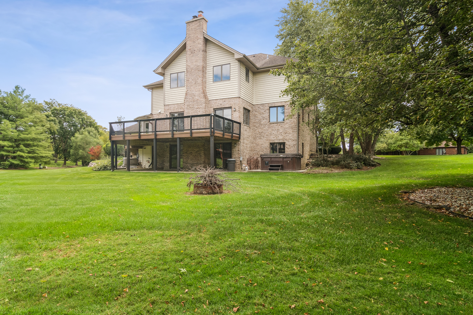 2223 Shetland Road Inverness, IL 60010 - Photo 35 of 40 a view of a house with a big yard and garden