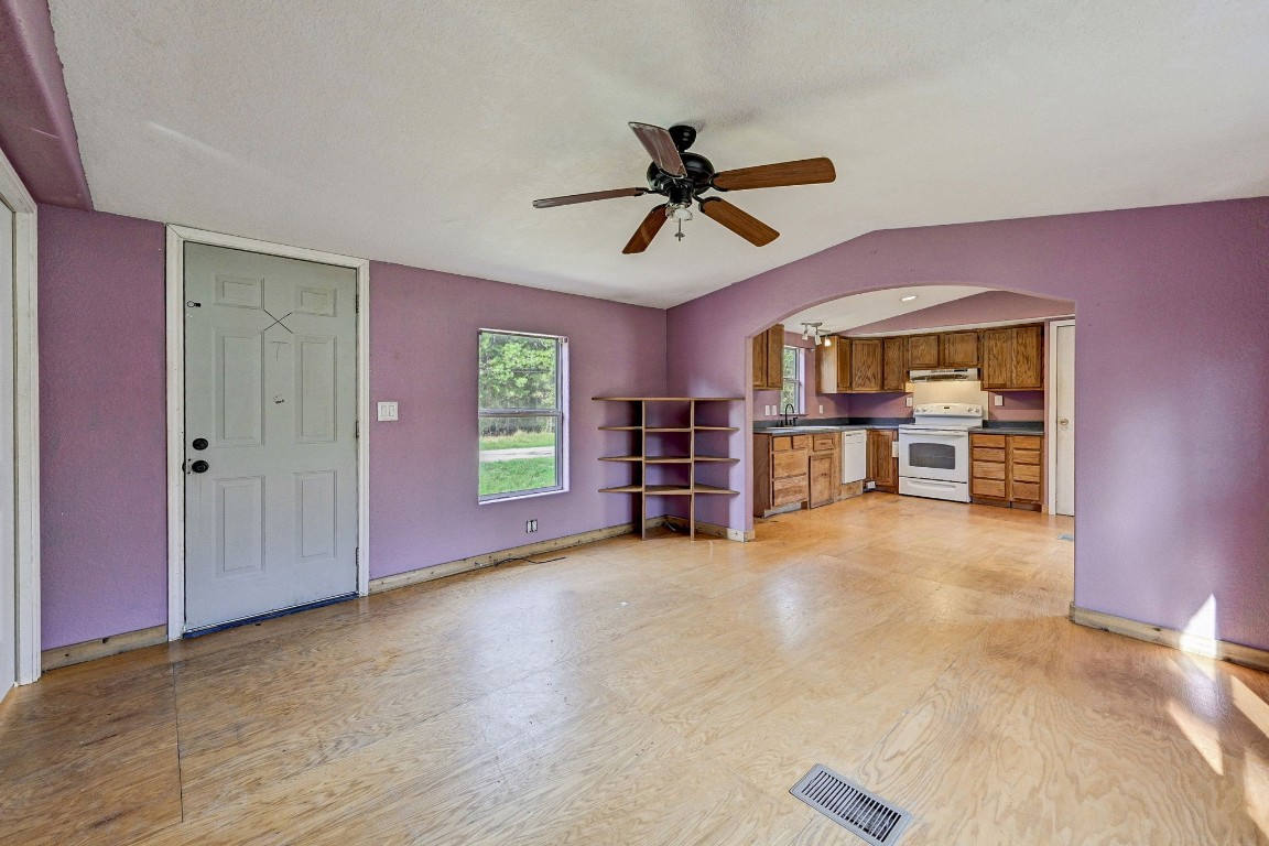 858 Big Hawg Road Trinity, TX 75862 - Photo 28 of 45 a view of a livingroom with furniture and a ceiling fan