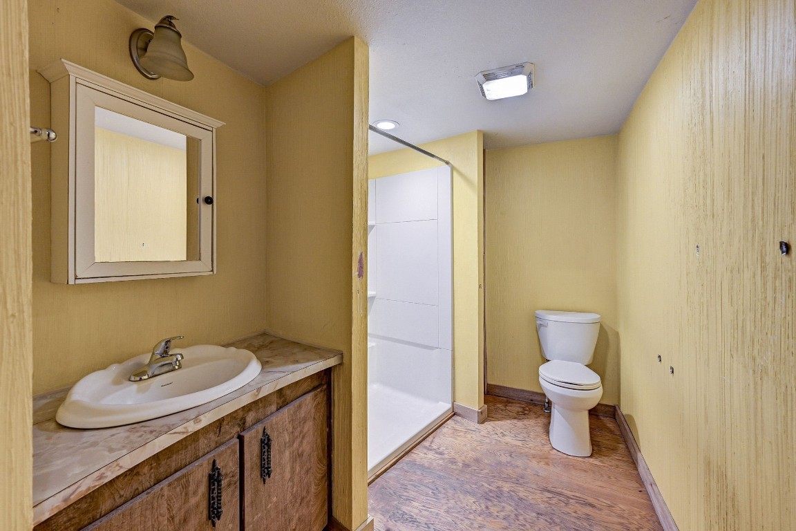 858 Big Hawg Road Trinity, TX 75862 - Photo 31 of 45 a bathroom with a sink toilet and shower