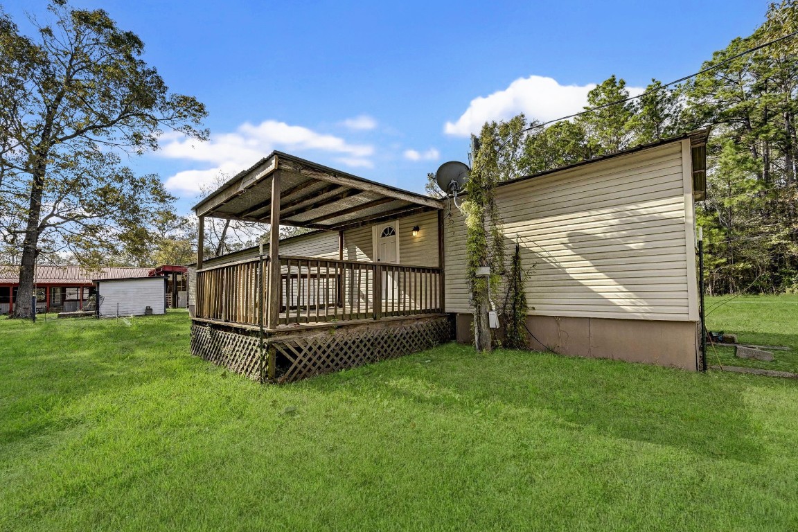 858 Big Hawg Road Trinity, TX 75862 - Photo 34 of 45 a view of house with a yard