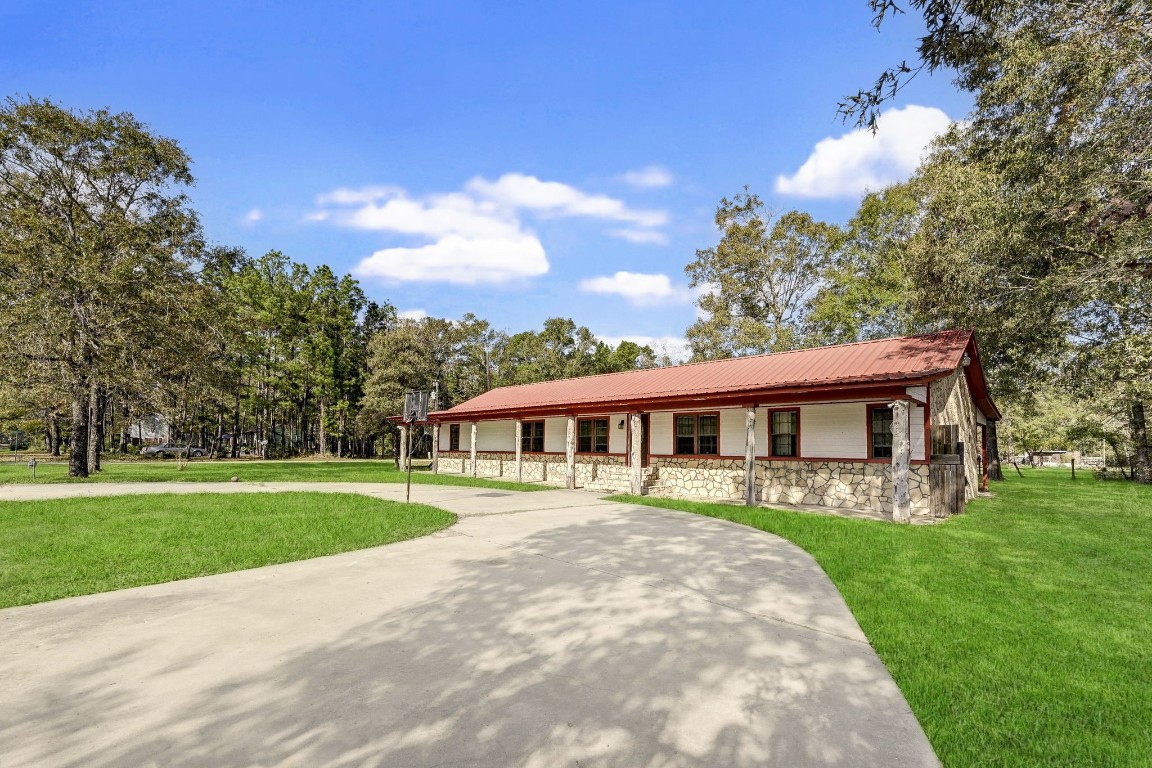 858 Big Hawg Road Trinity, TX 75862 - Photo 5 of 45 a view of a house with a yard