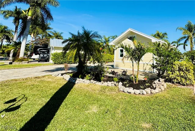 a view of a swimming pool with a garden