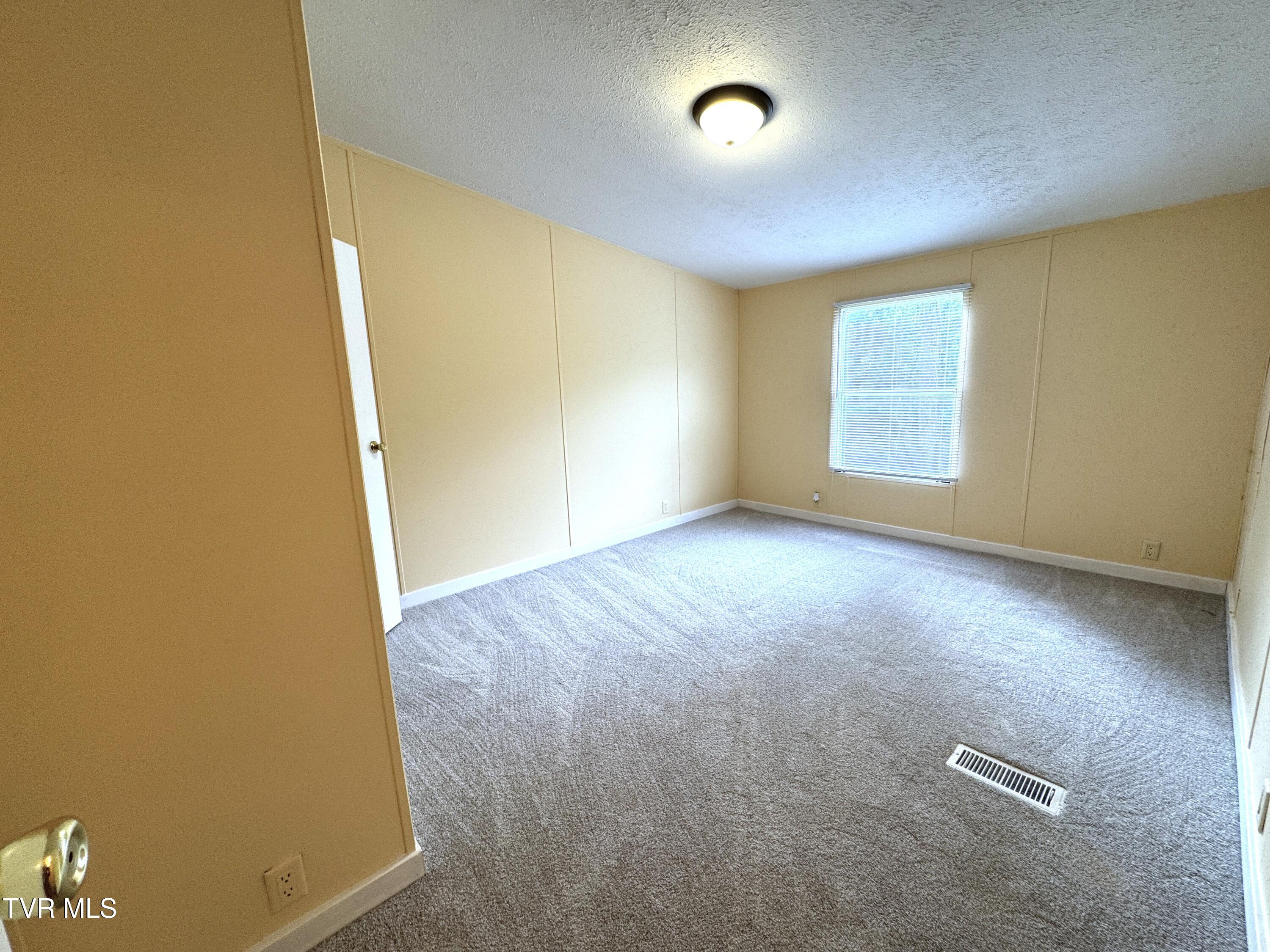 1555 Hamner Hollow Road Big Stone Gap, VA 24219 - Photo 27 of 41 BEDROOM 2 FROM HALLWAY