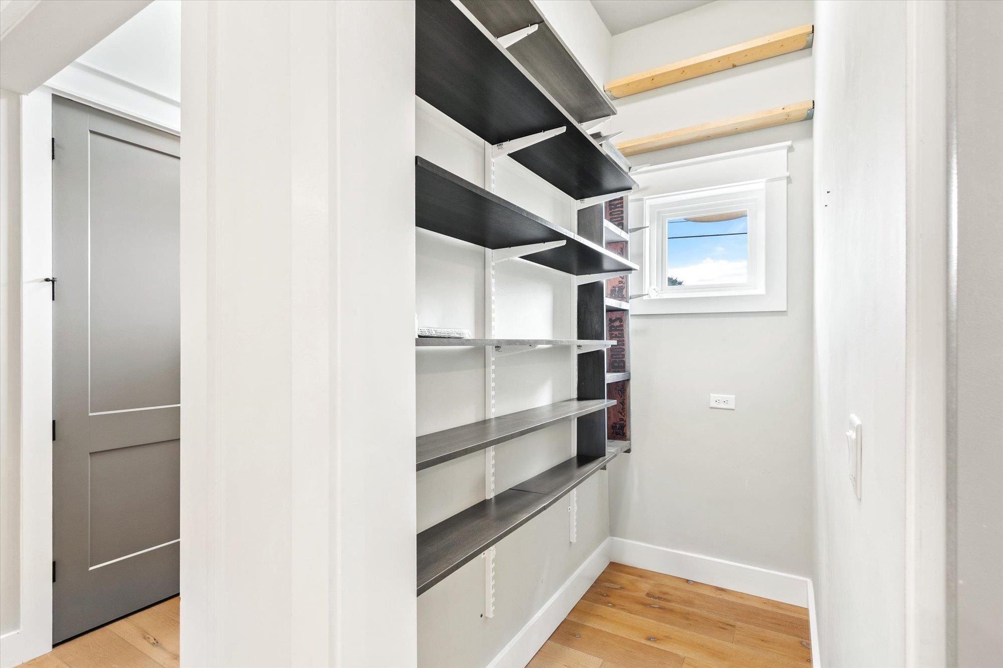 80 Ferrol Road St. Augustine, FL 32084 - Photo 13 of 61 a view of walk in closet with empty racks