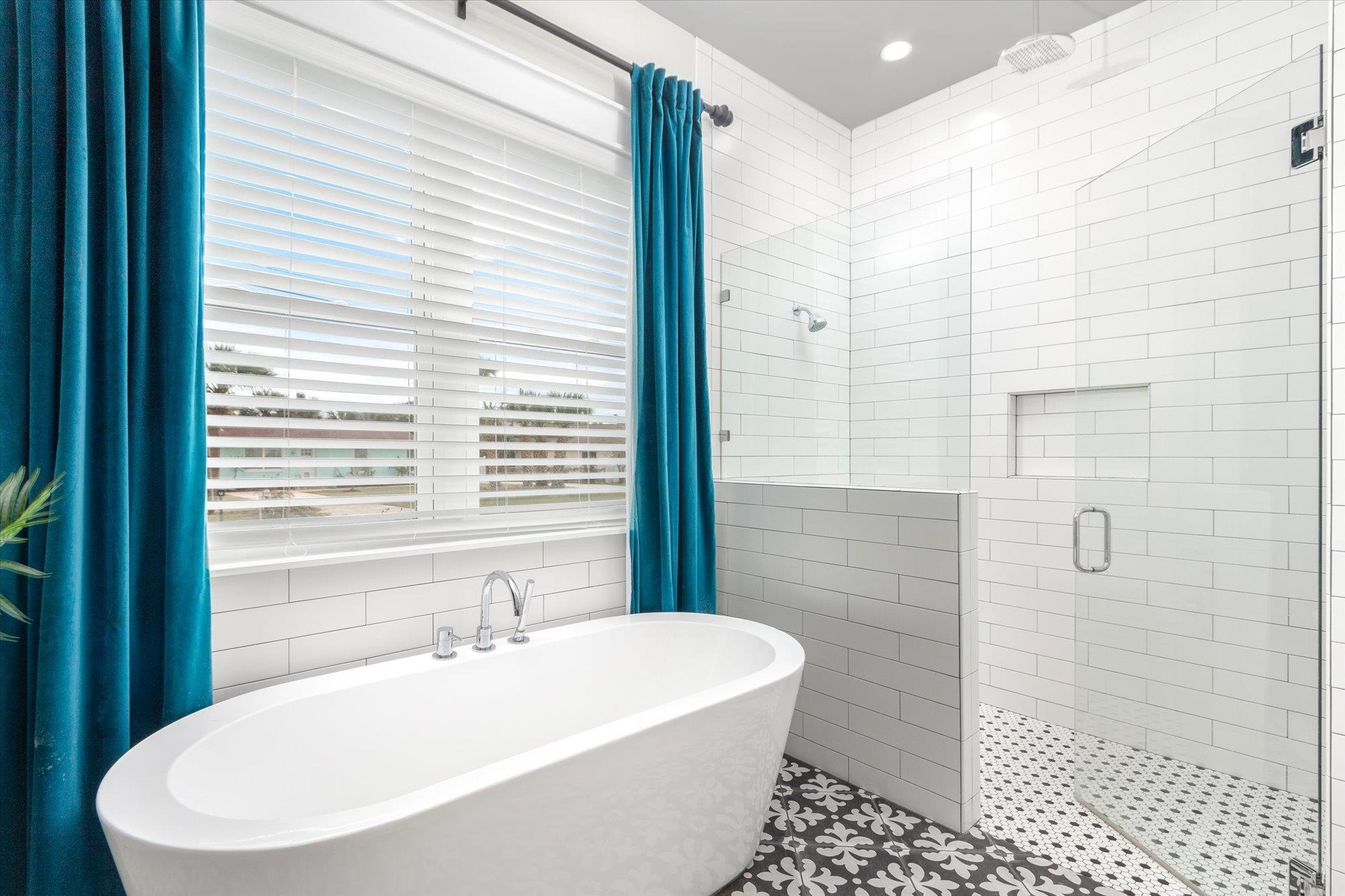 80 Ferrol Road St. Augustine, FL 32084 - Photo 23 of 61 a white bath tub sitting next to a white sink