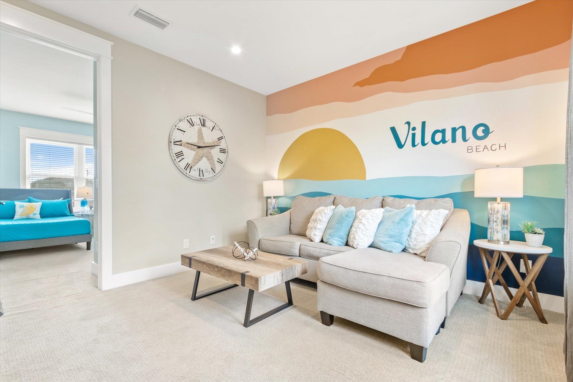 80 Ferrol Road St. Augustine, FL 32084 - Photo 28 of 61 a living room with furniture and a table