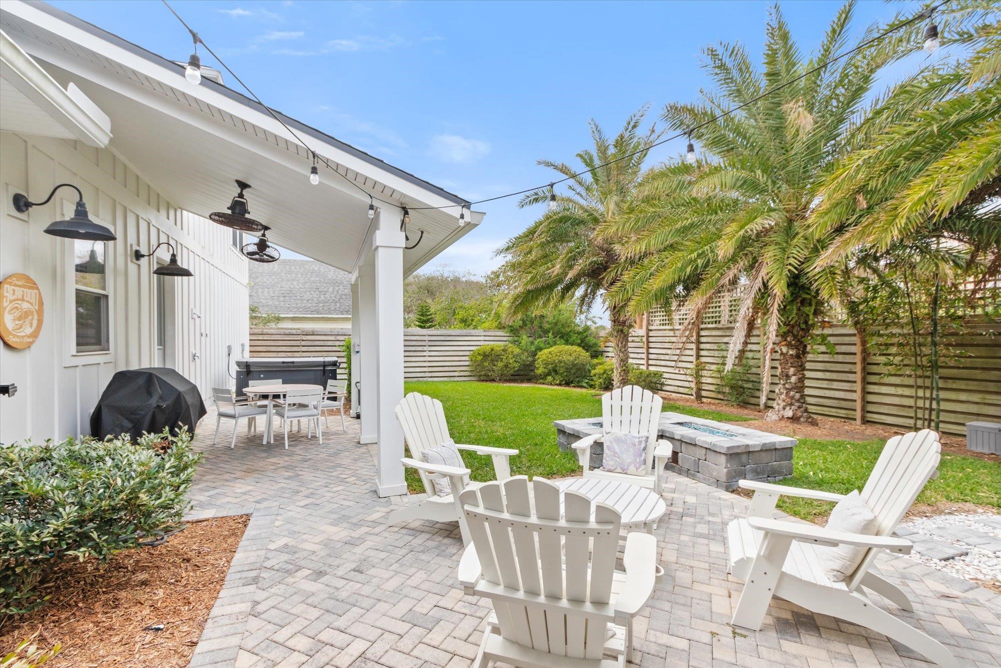 80 Ferrol Road St. Augustine, FL 32084 - Photo 38 of 61 a view of a patio with chairs and table