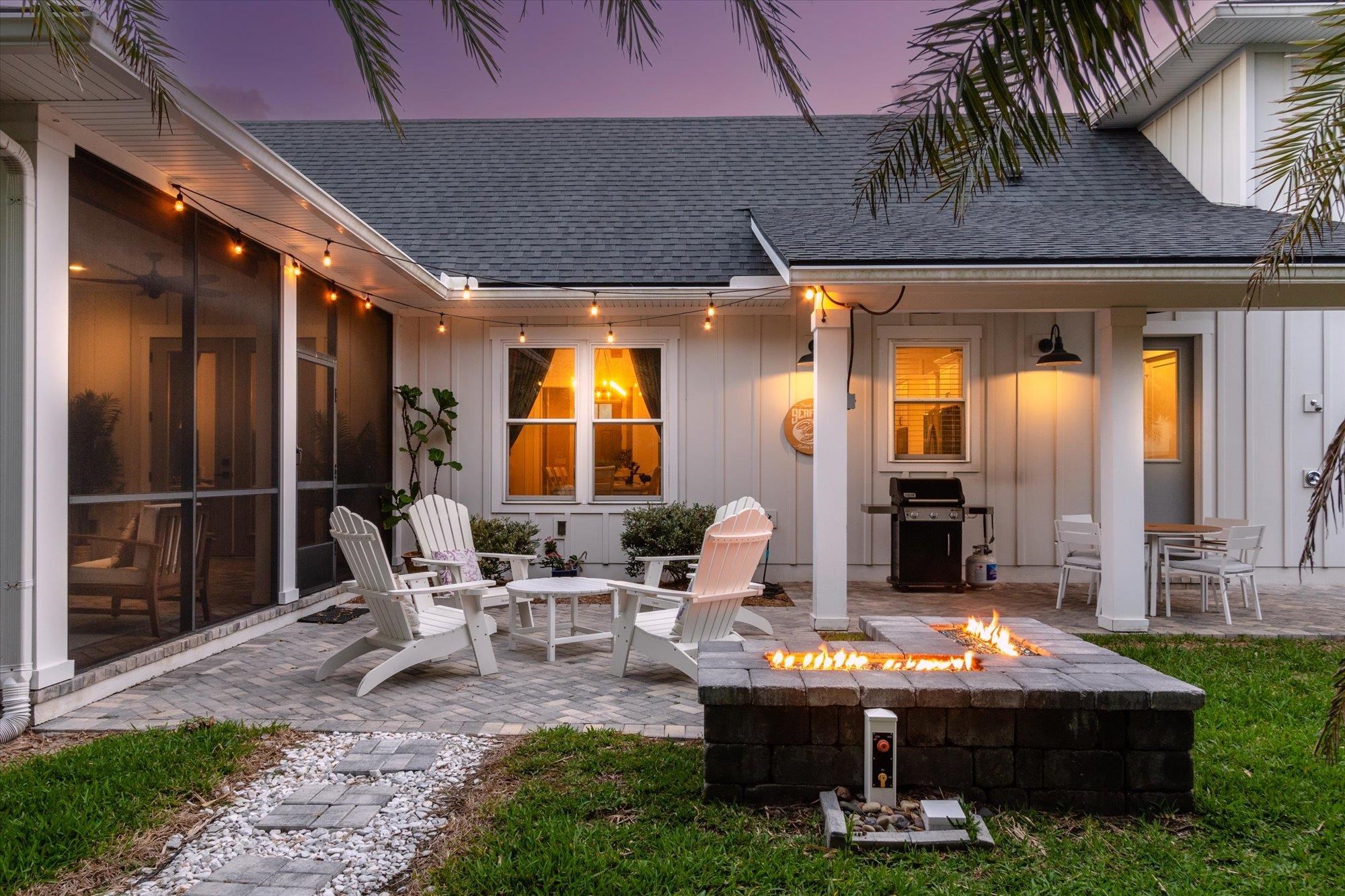 80 Ferrol Road St. Augustine, FL 32084 - Photo 46 of 61 a view of an house with backyard porch and patio