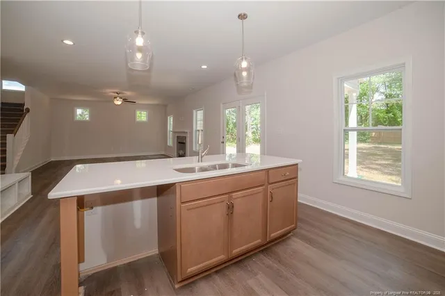 a large bathroom with a sink and a mirror