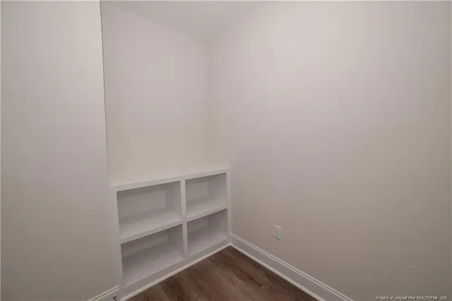 a view of an empty walk in closet