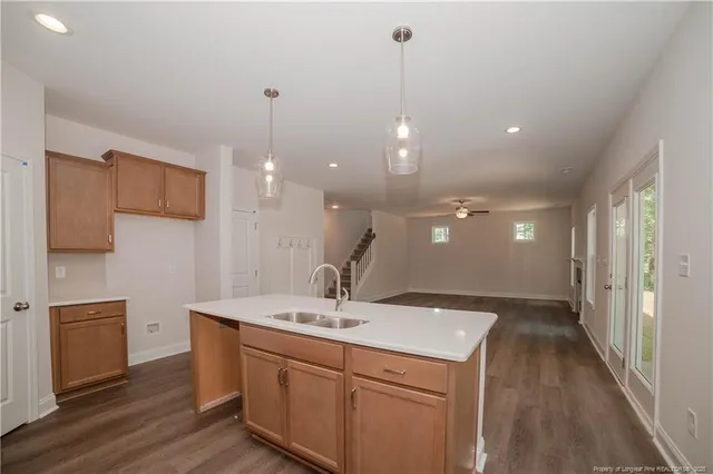a bathroom with a sink a vanity and a mirror