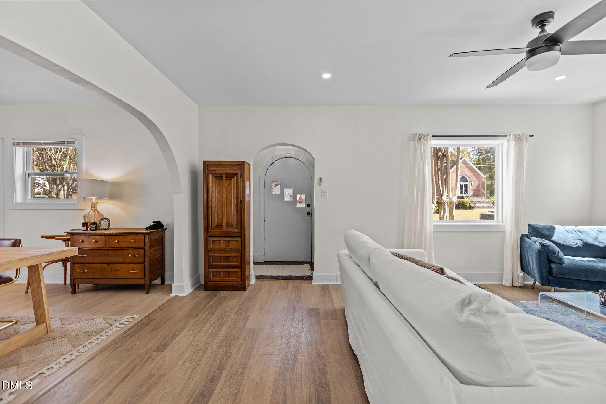 2707 North Roxboro Street Durham, NC 27704 - Photo 10 of 44 a bedroom with furniture and wooden floor