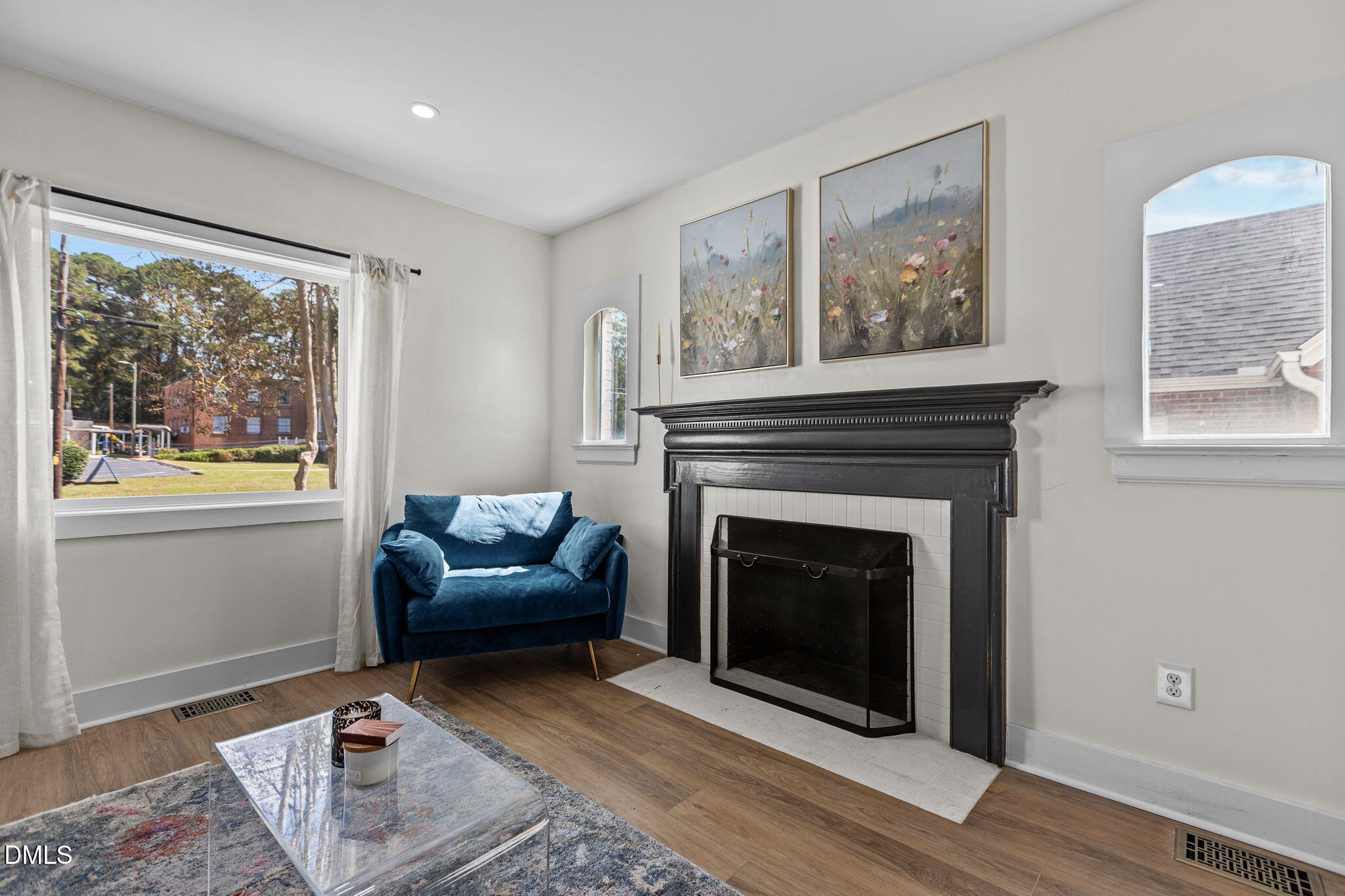 2707 North Roxboro Street Durham, NC 27704 - Photo 13 of 44 a living room with furniture and a fireplace