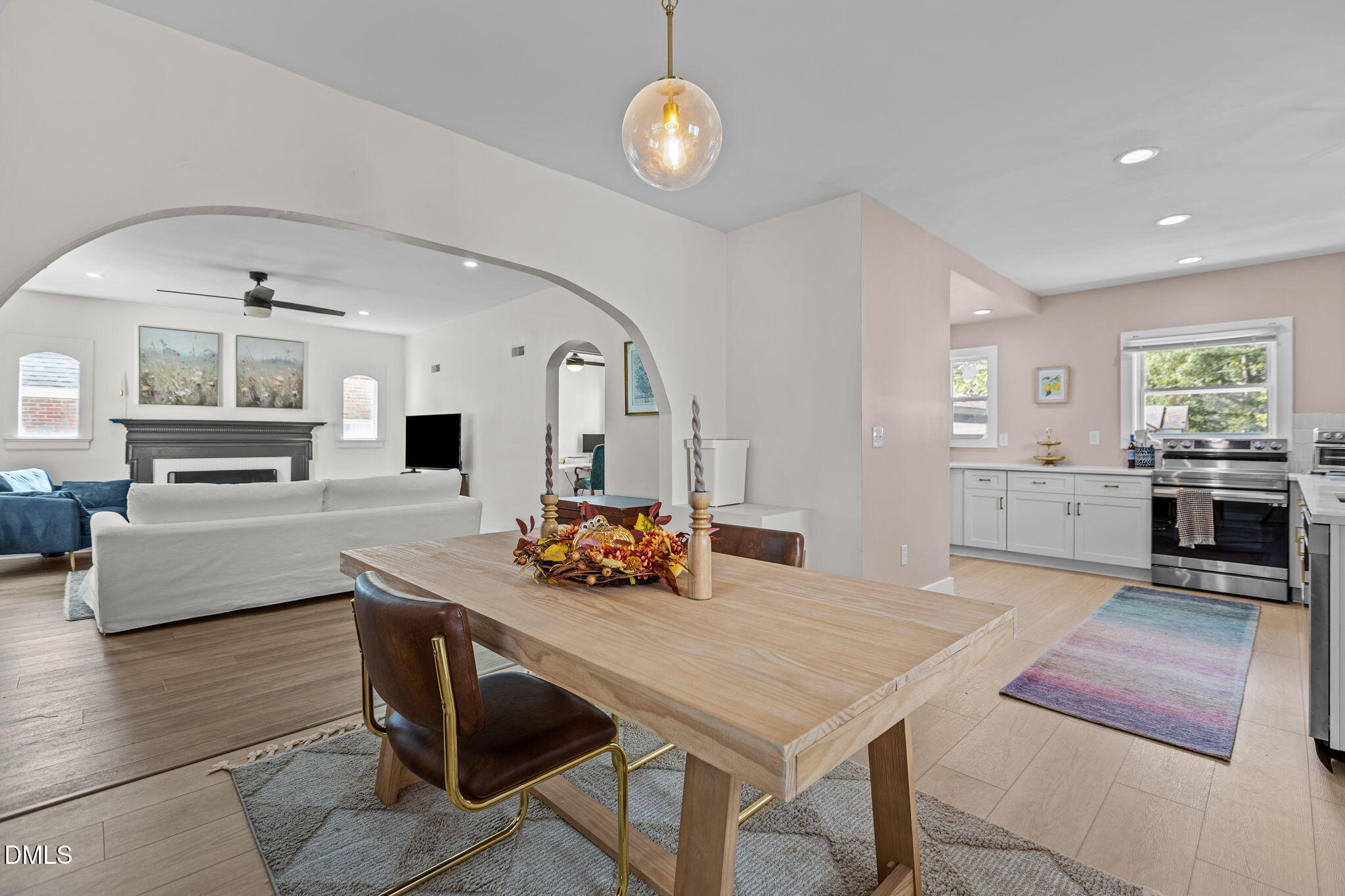 2707 North Roxboro Street Durham, NC 27704 - Photo 17 of 44 a view of kitchen with dining table and chairs