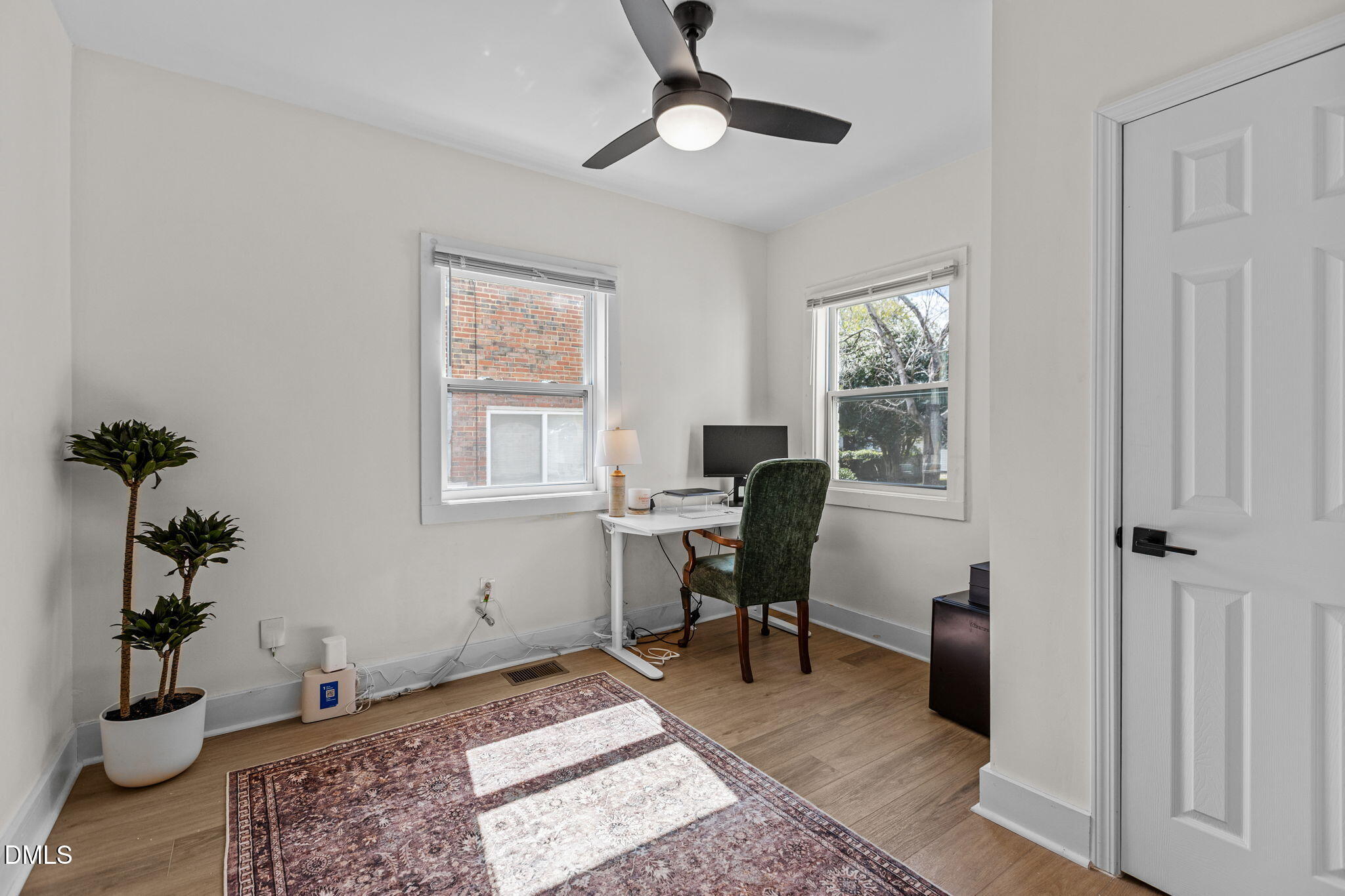 2707 North Roxboro Street Durham, NC 27704 - Photo 22 of 44 a workspace with wooden floor and a window